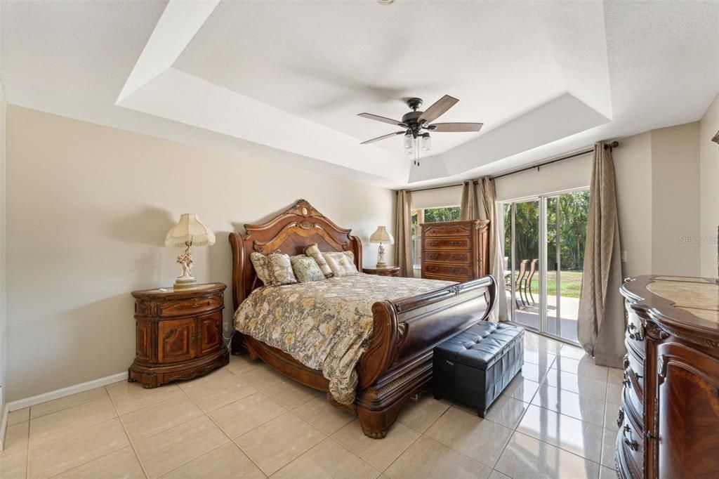 This spacious master suite features a sliding door that opens to your private back porch