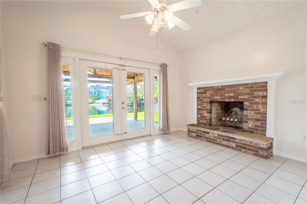 The family room features ceramic tile flooring, French Doors that leadto the covered patio and a ceiling fan for year-round comfort.