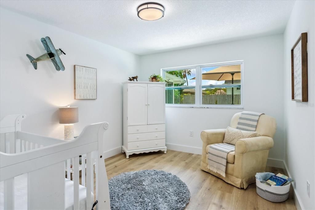 Bedroom 2 located on the far side of the home