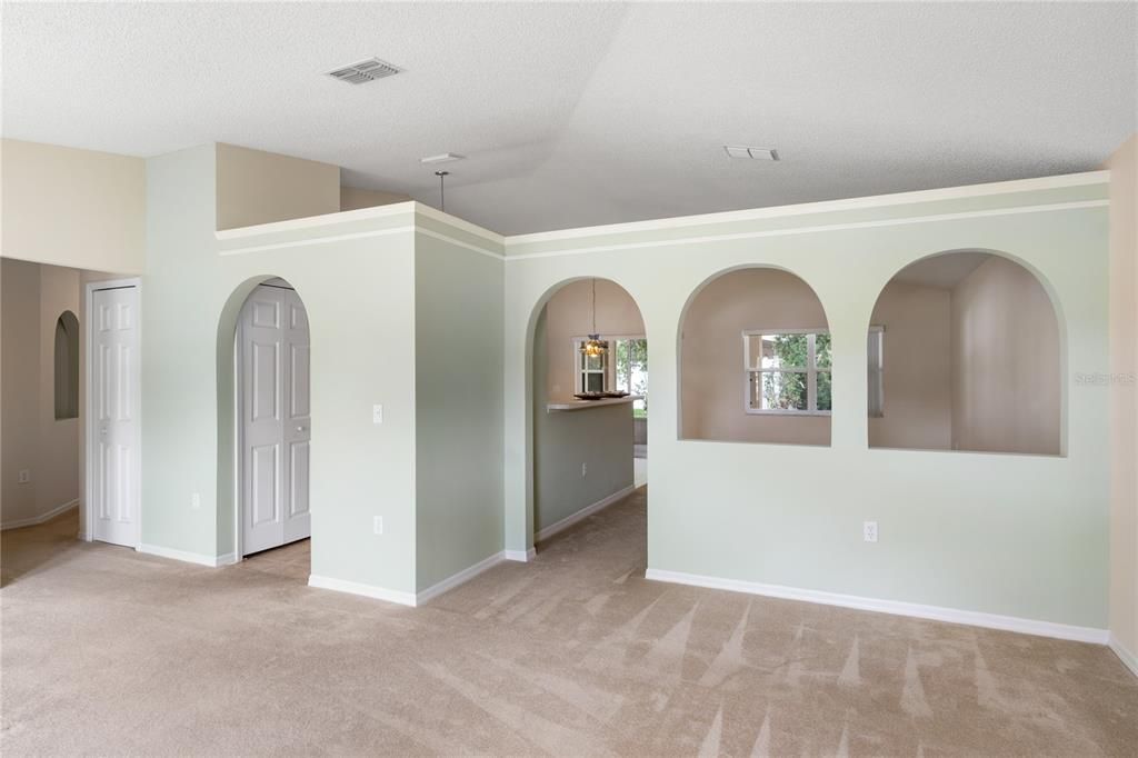 Unique arch doorway and openings set this house apart from the rest.