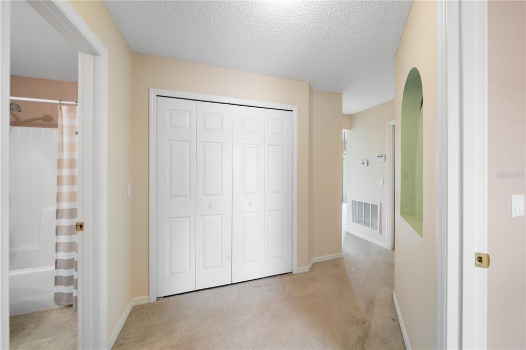 Two way split separates the main bedroom from the secondary bedrooms with a double closet for washer and dryer