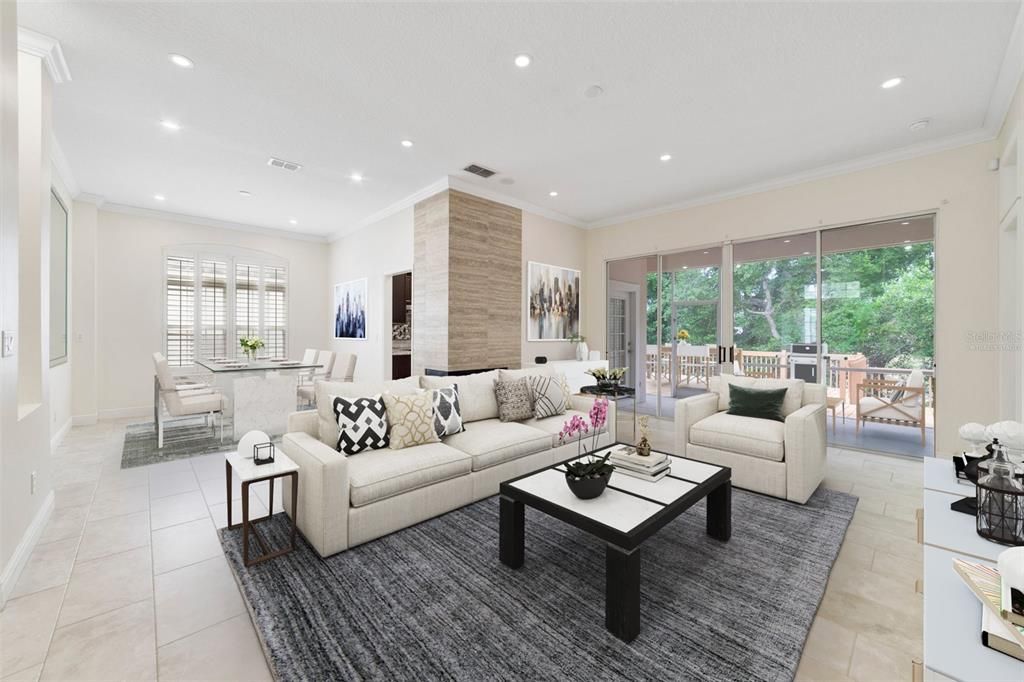 Your foyer has a line of sight straight through OVERSIZED SLIDING GLASS DOORS for a lovely view of the trees and pond beyond giving you a serene backdrop to the OPEN CONCEPT living and dining areas. Virtually Staged.