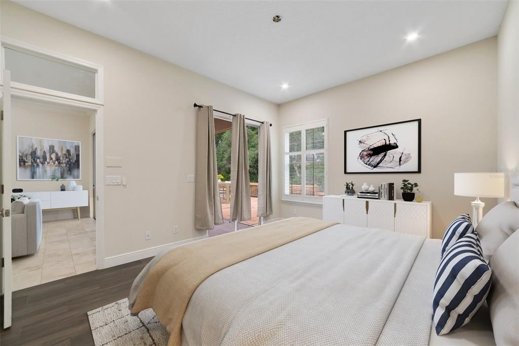 A generous PRIMARY SUITE awaits you with its own access to the lanai, WOOD LOOK TILE FLOORS, WALK-IN CLOSET with floor to ceiling CUSTOM STORAGE and a private en-suite bath. Virtually Staged.