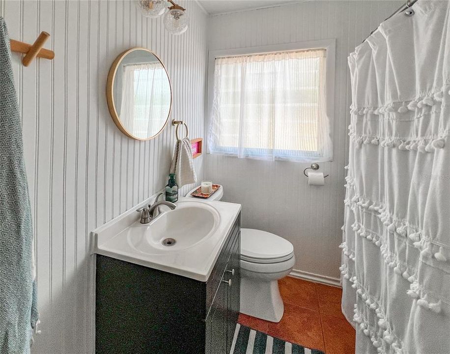 The Hallway Bathroom has had some updates over the years: the vanity, wainscoting, and some of the fixtures.