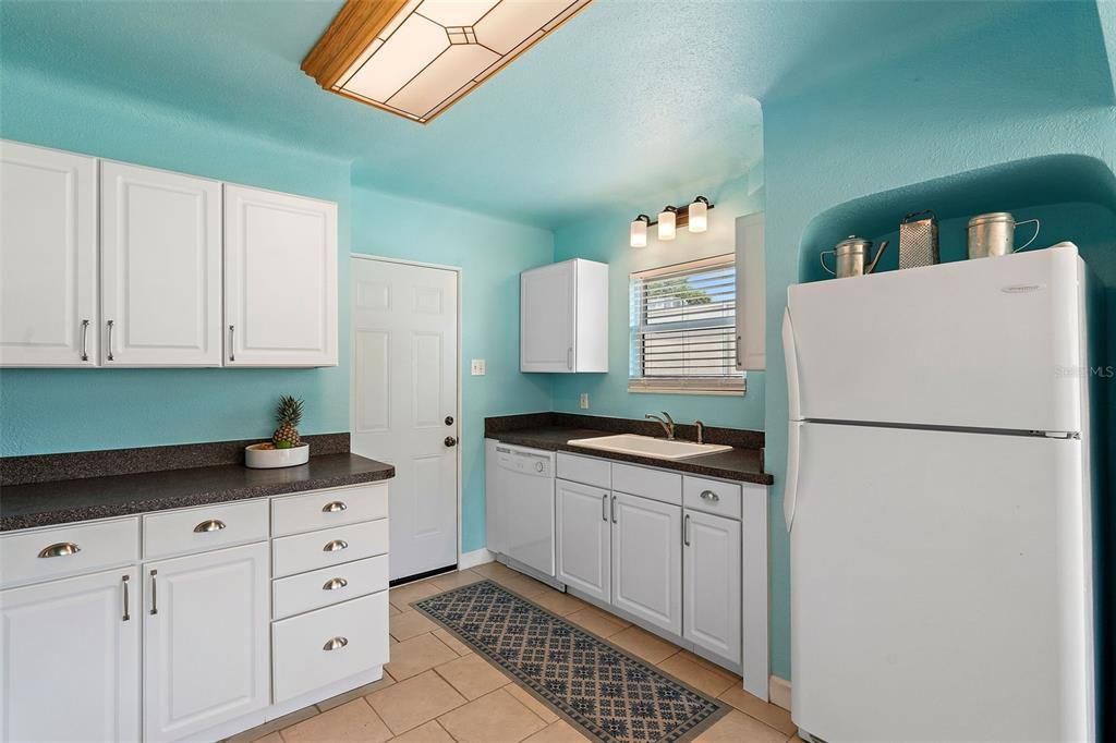 Kitchen with easy access to backyard.