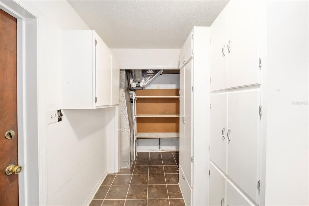 LOTS OF STORAGE IN LAUNDRY AREA