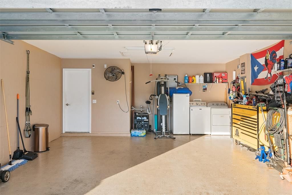 Double garage, included: Tankless hot water heater, washer dryer, Culligan water treatment equipment.