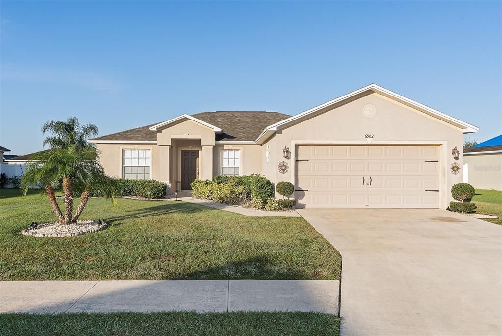 Exterior front, showing double wide driveway , sidewalks , nice curb appeal, New in 2018 roof!