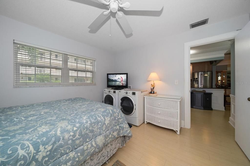 Guest Bedroom with washer and dryer