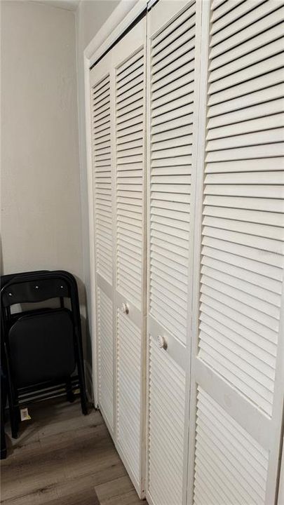 Wall of closets in primary bedroom