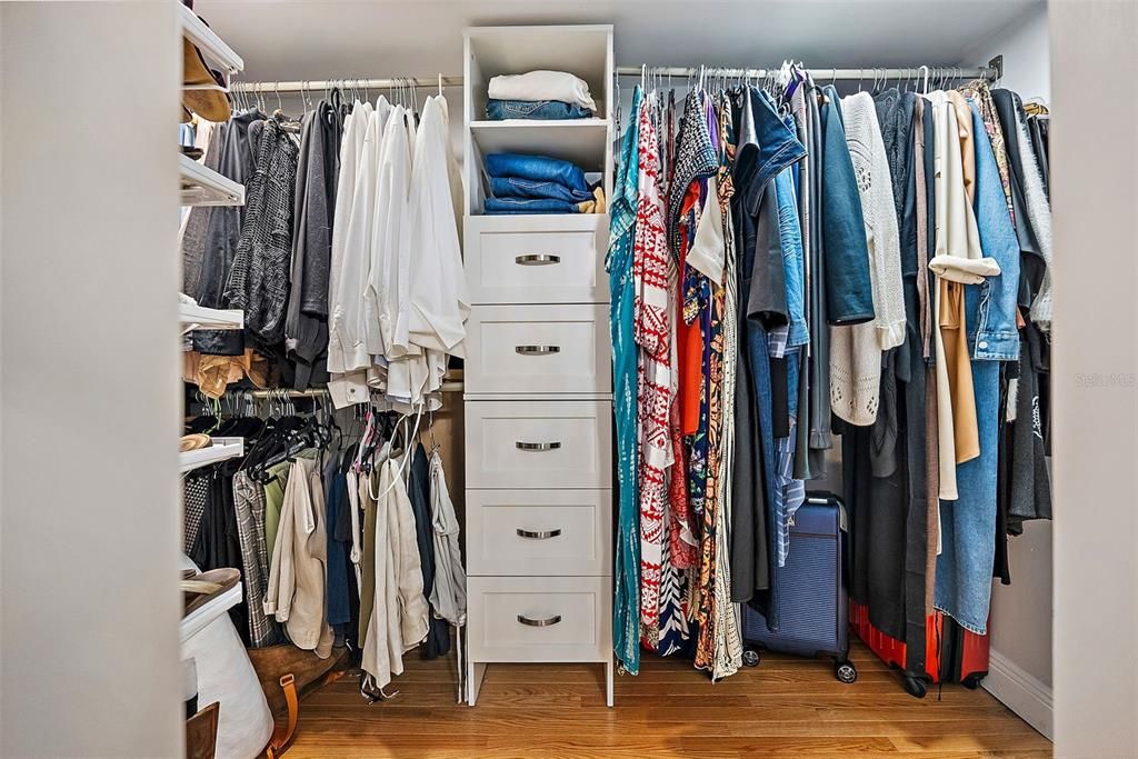 Primary walk-in closet and closet system for maximum organization.
