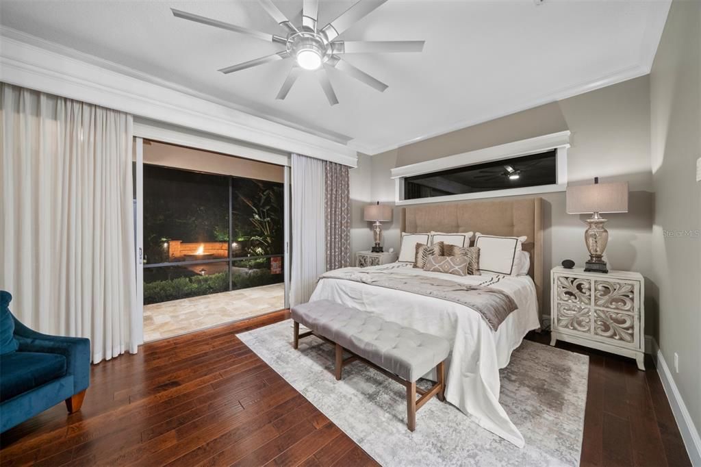 Master bedroom overlooking pool and fire pit