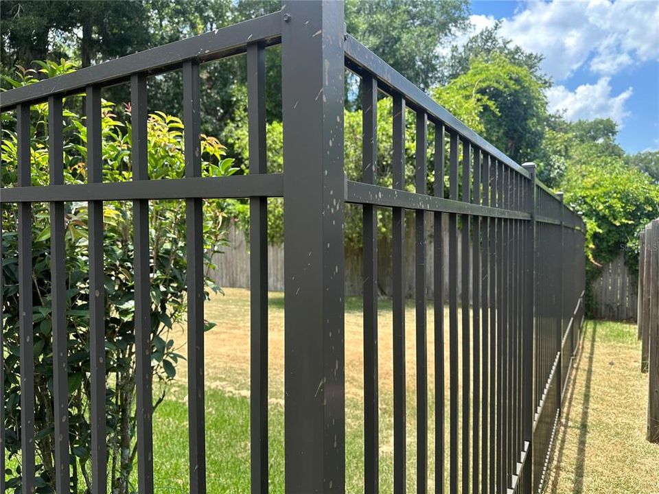 Aluminum fencing around perimeter of homesite