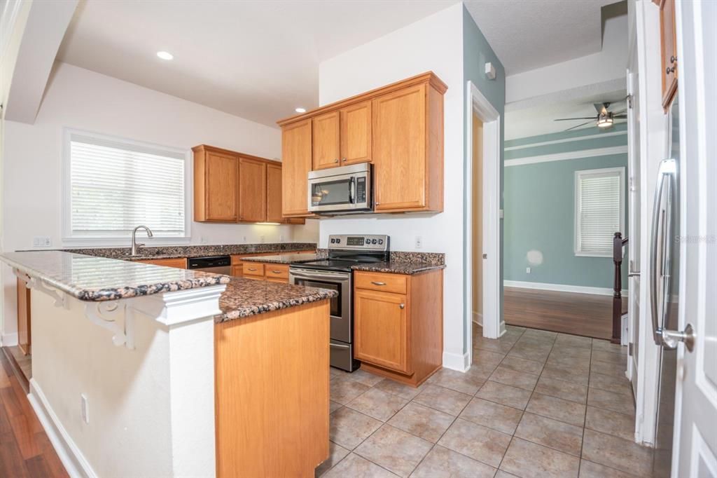 Convenient Snack Bar Setting and All Stainless Appliances Included!