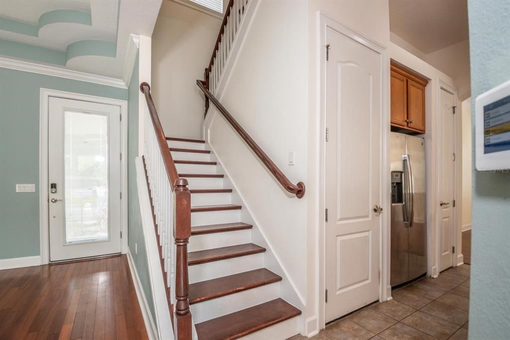Grand Staircase To Upstairs With Wood Treads, Wood Center Landing, Handrail & Railing, and Decorative Wood Balusters!
