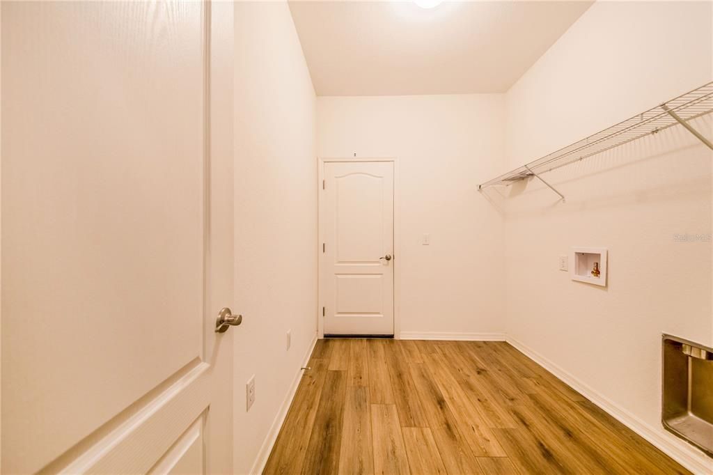 Laundry Room with Hook-Ups and entry to 2 car garage