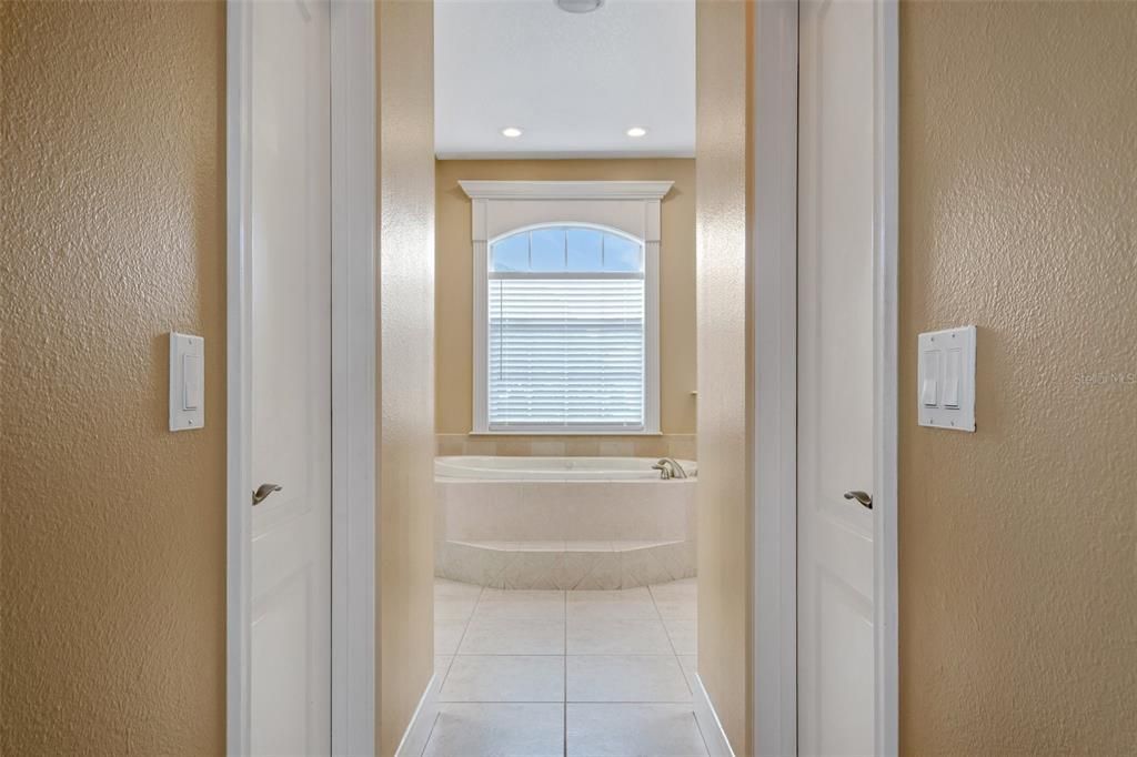 There are TWO walk-in closets leading to the en-suite bathroom.