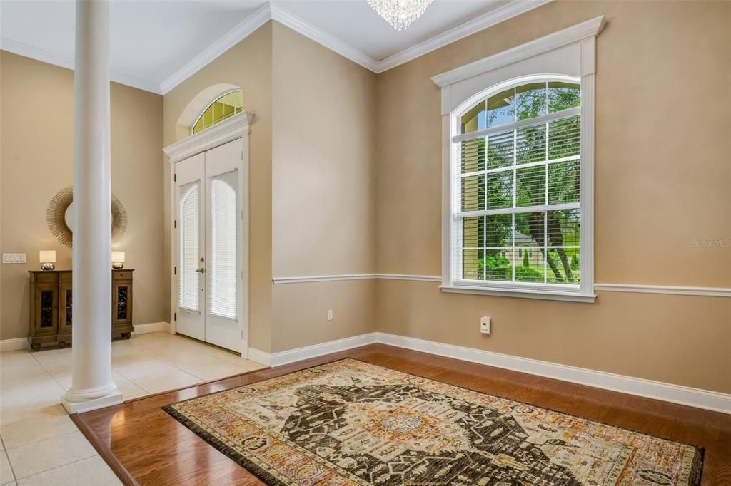 High ceilings and beautiful millwork are just one fo the many special features of this home.