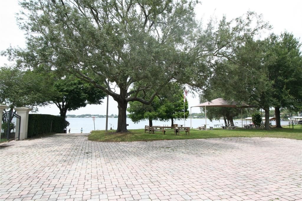 PRIVATE COMMUNITY PAVERED PARKING AREA FOR ACCESS TO THE CONWAY CHAIN OF LAKES FOR THE BEST IN BOATING, SKIING, FISHING, PICNICS, DOCK AND THE BEACH FOR THE ABSOLUTE MOST IN FAMILY FUN!