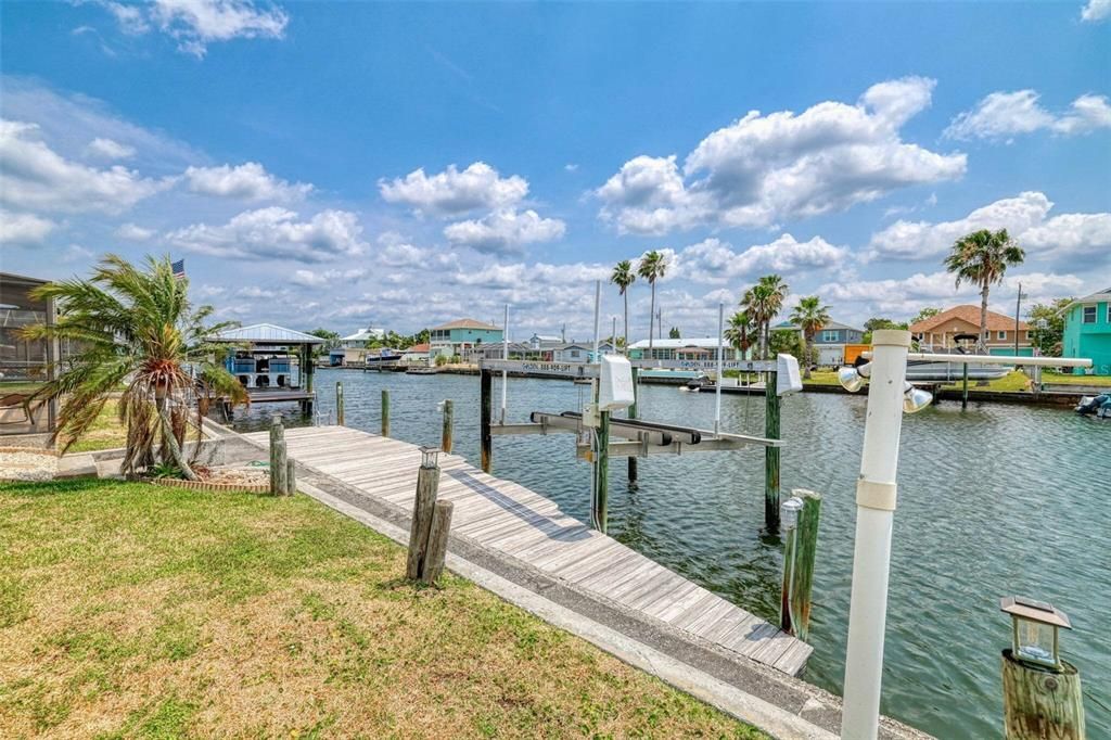 Stationary dock with boat lift.