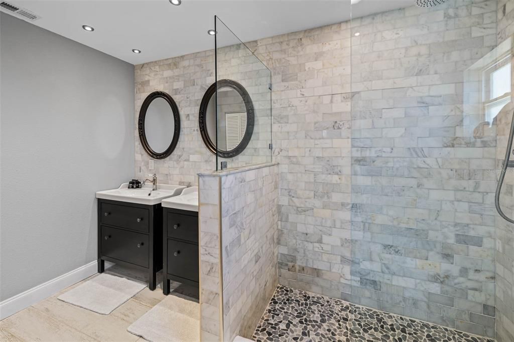Primary suite bathroom with oversized shower.