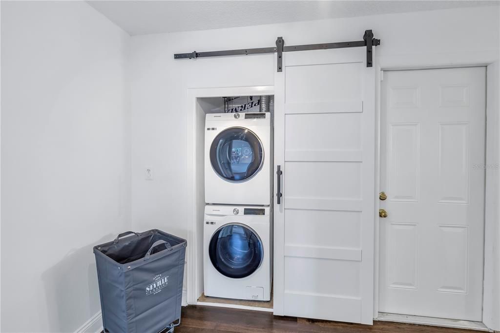 laundry closet off kitchen next to pantry