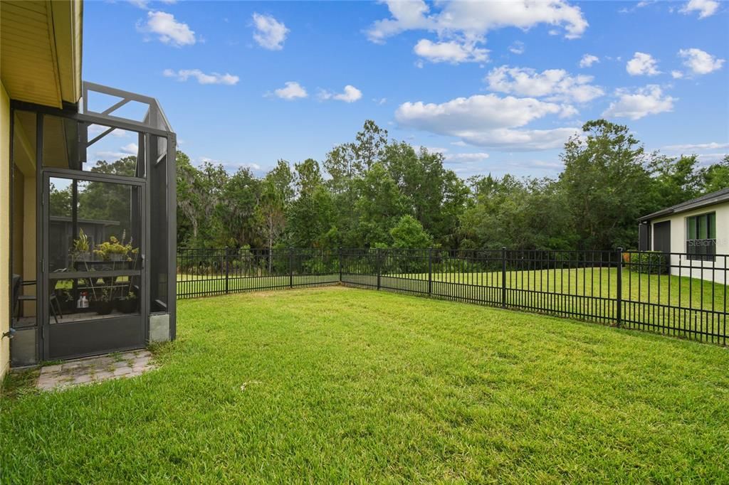 LARGE FENCED IN YARD WITH CONSERVATION VIEWS