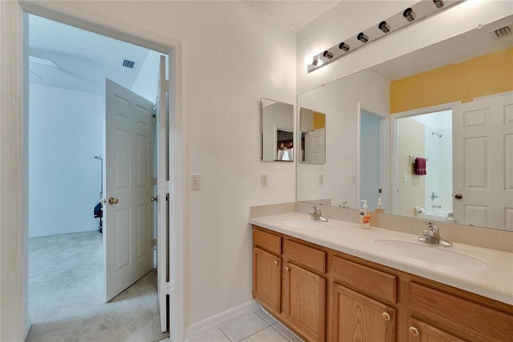 Jack and Jill Bathroom (2) with Double Vanity shared between (Secondary Bedrooms (2 & 3))