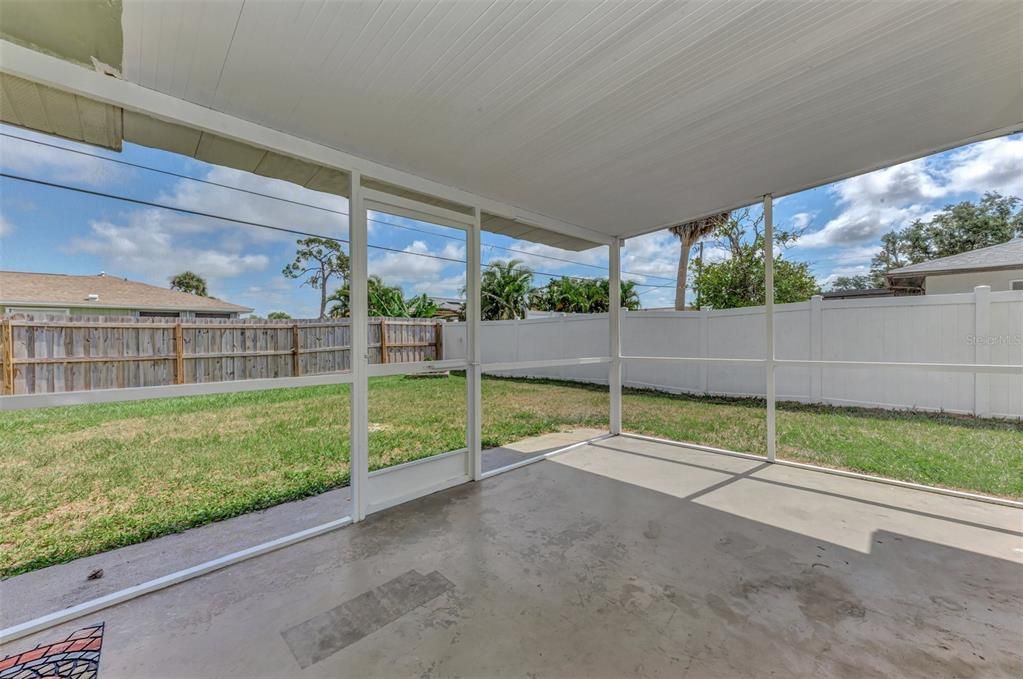 Screen in Lanai over looing the large back yard