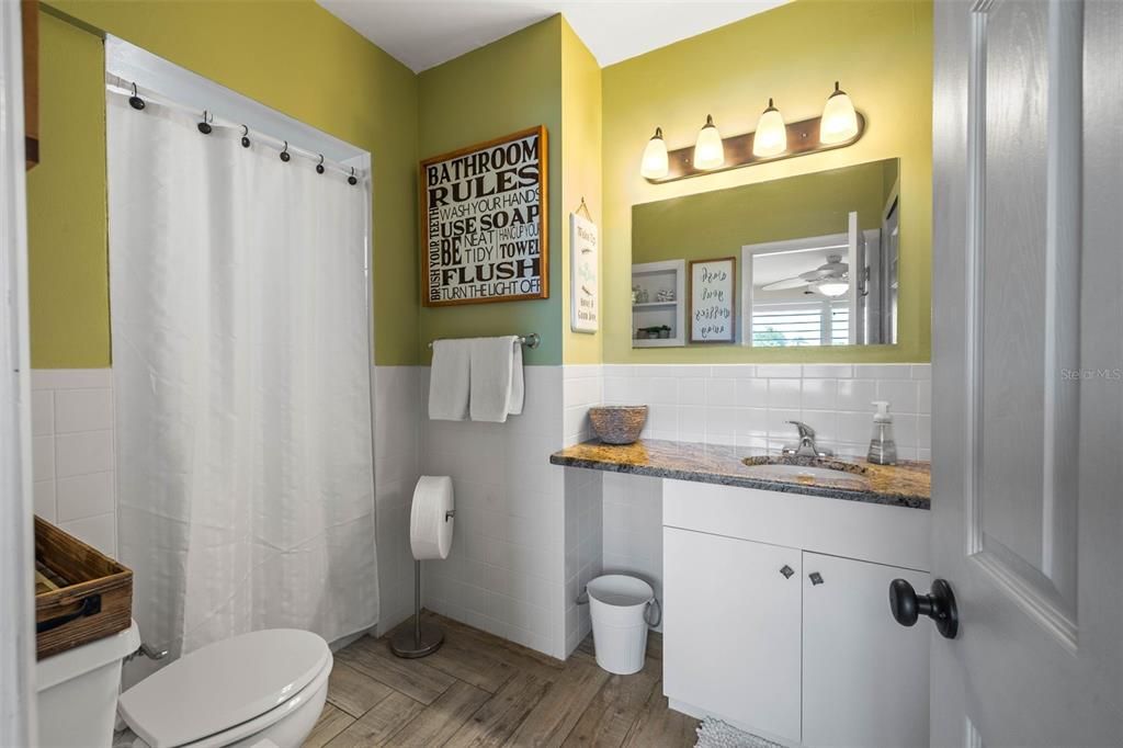 En-suite bathroom with walk-in shower and plenty of storage