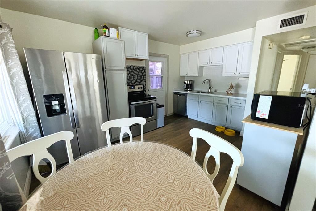 DINING AREA KITCHEN ON THE BACK