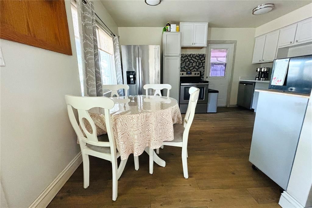 DINING AREA KITCHEN ON THE BACK