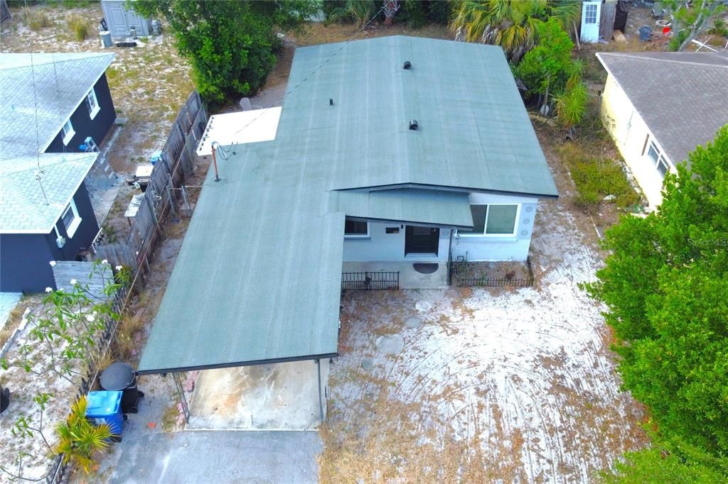 AERIAL VIEW OF THE HOUSE AND NEW ROOF