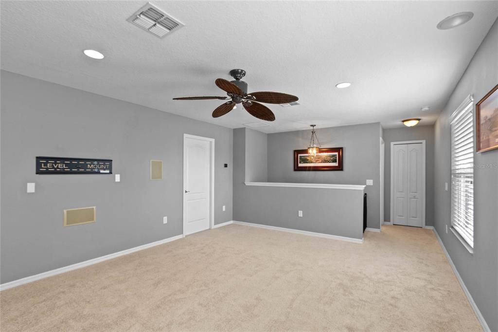 View of the second floor loft with built in sound system.