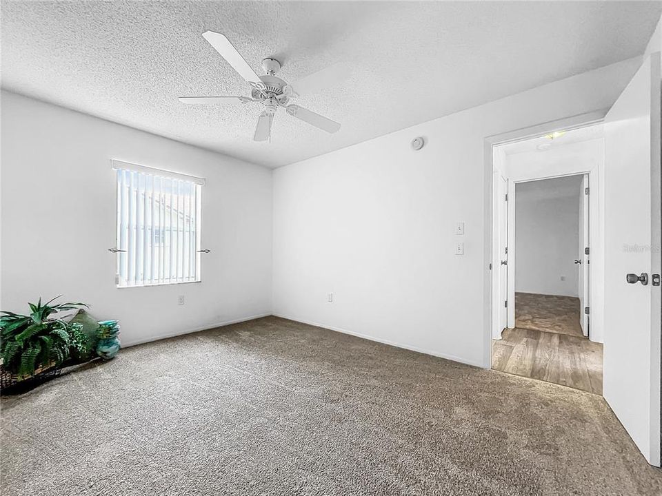 Spacious second bedroom with new carpet