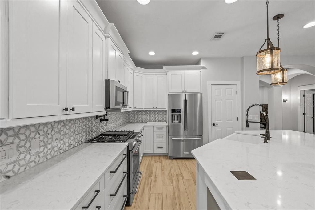 Stunning new kitchen with white cabinetry and spacious island!