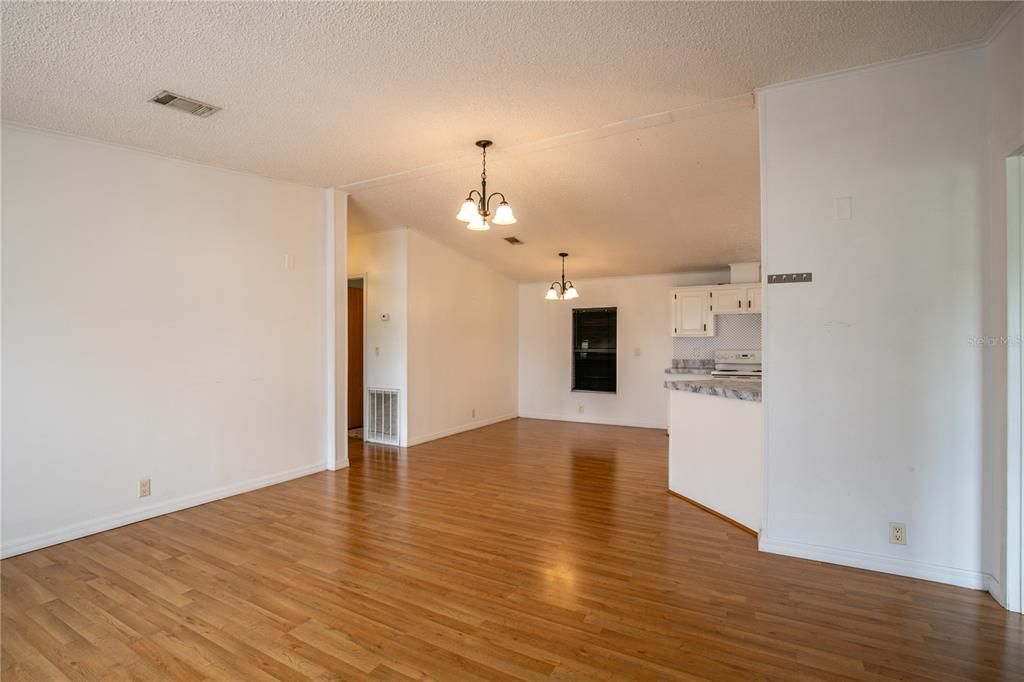 Looking from the Living Room to the Dining Room which opens on to the Kitchen.