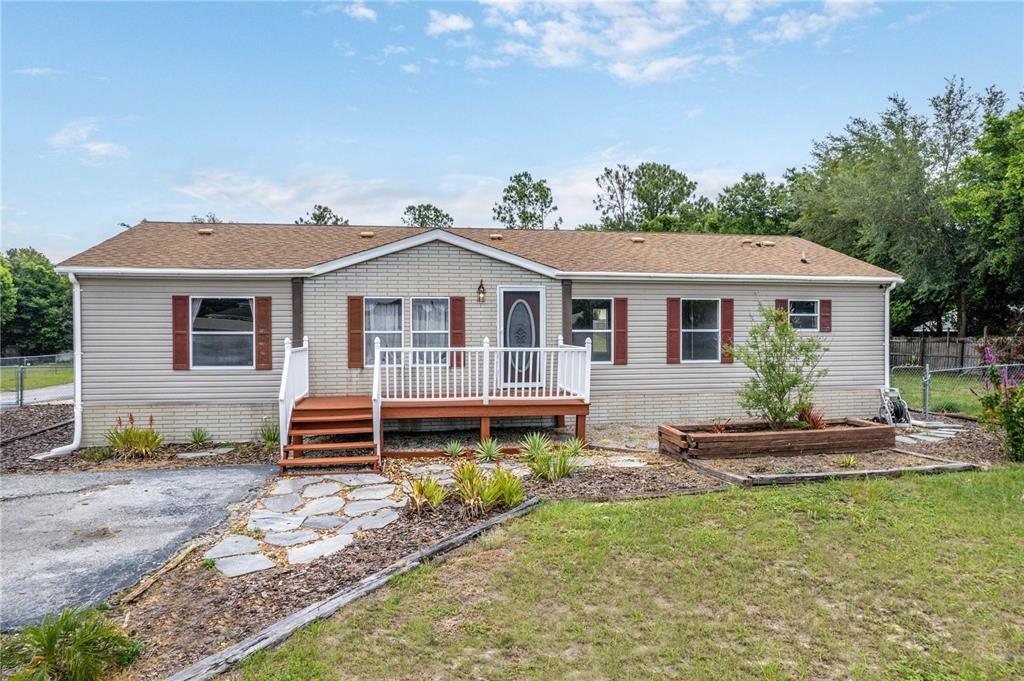 This immaculate home occupies a 1.33-acre fully fenced lot within the City of Eustis.