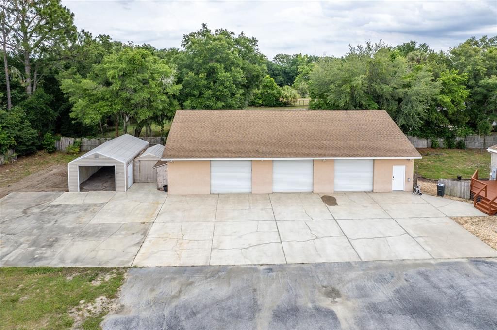 Three outbuildings include a 60x40 air-conditioned block garage that can accommodate up to 12 vehicles.