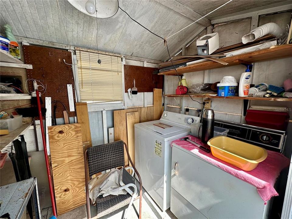 Washer/Dryer are located in the shed