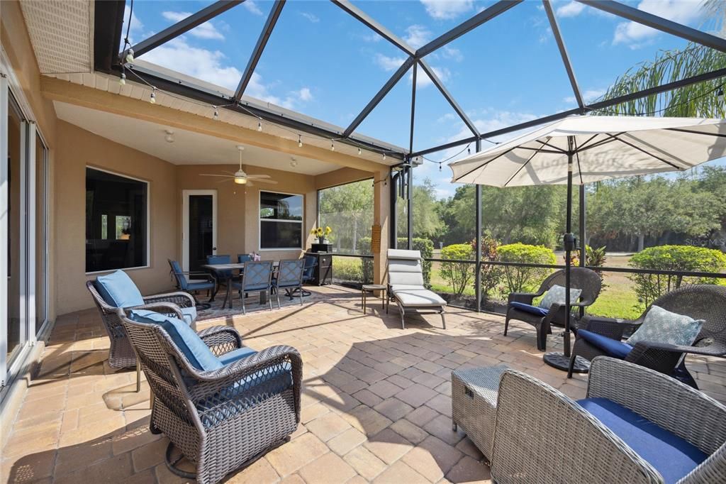 Oversized brick paver covered lanai is private and perfect for entertaining family, guests and friends.