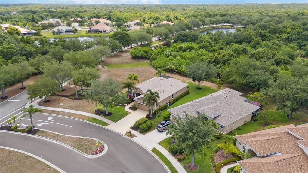 Located in highly desirable gated community of Greyhawk Landing, corner lot, surrounded by all of nature and two large lakes for all your enjoyment of the Florida lifestyle.