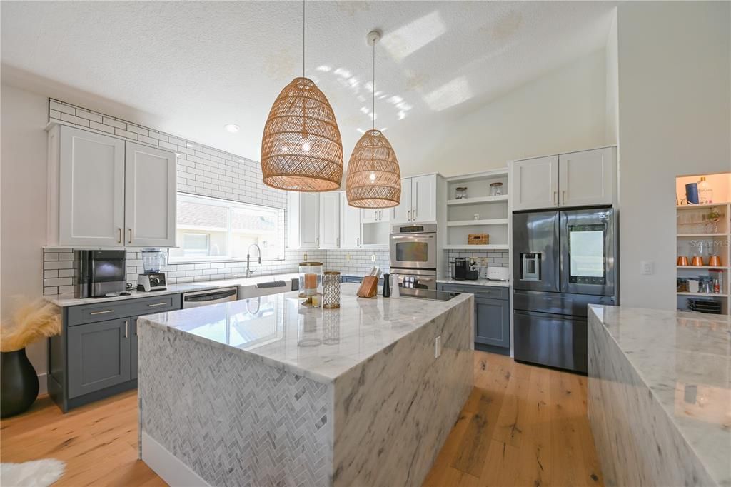 Completely renovated Kitchen, Granite Countertops, Stainless Steel High End Appliances, New Flooring.