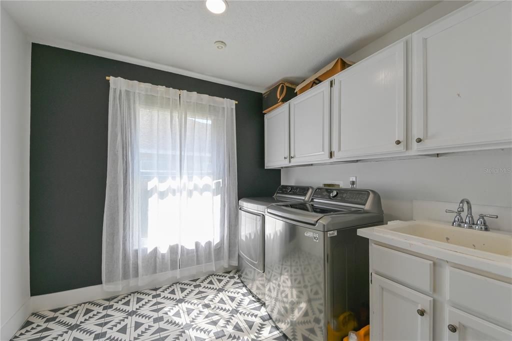 Laundry Room, New Flooring, Cabinets and sink