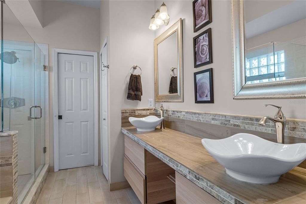 Updated primary bath with dual vanities