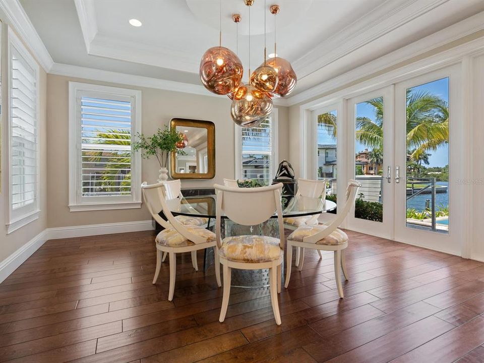 Dining area overlooking pool/canal