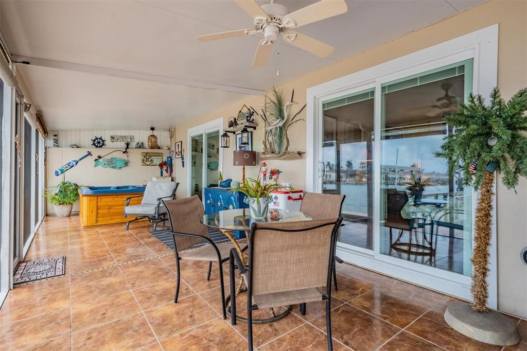 Enjoy magnificent sunsets from your 57 foot screened-in lanai