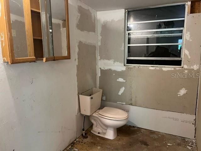 Unfinished bathroom in separate entrance -