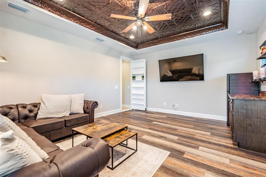 Second floor game/bonus room with copper ceiling detail