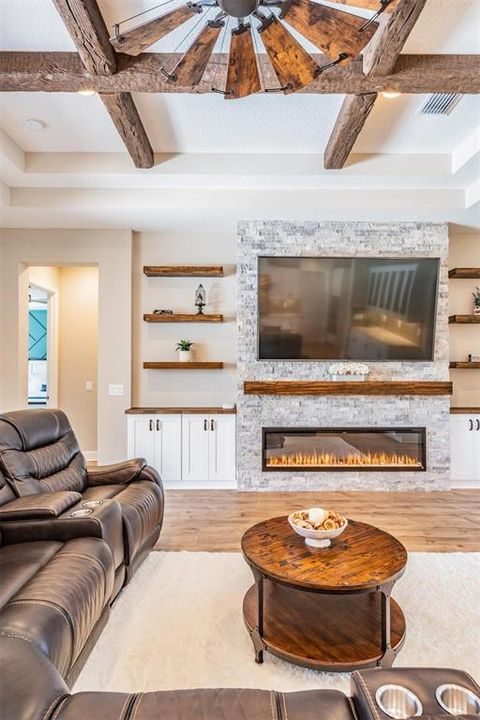 Wood accent beams in tray ceiling